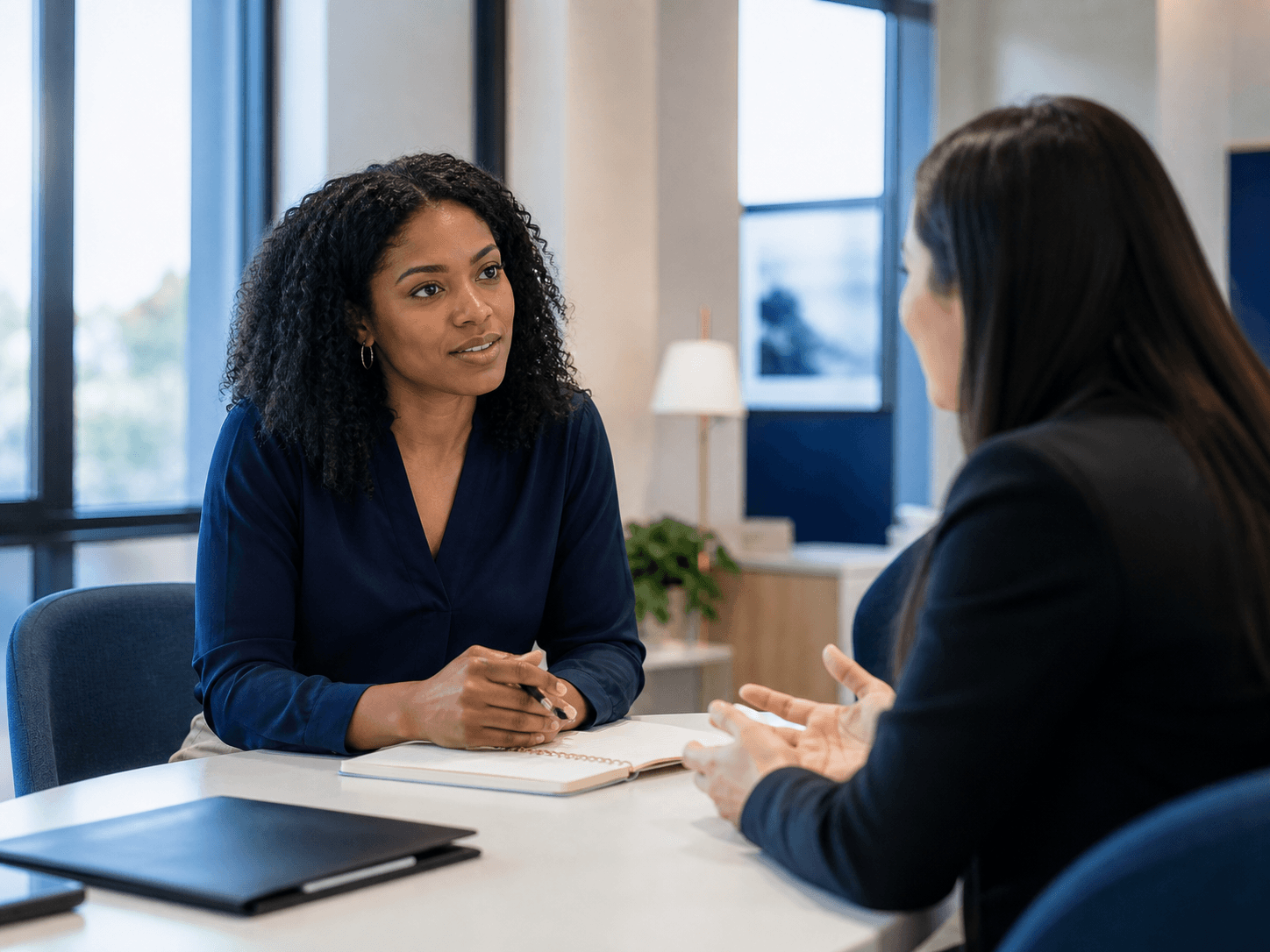 A candidate discussing her career goals and preferred work environment with a recruiter