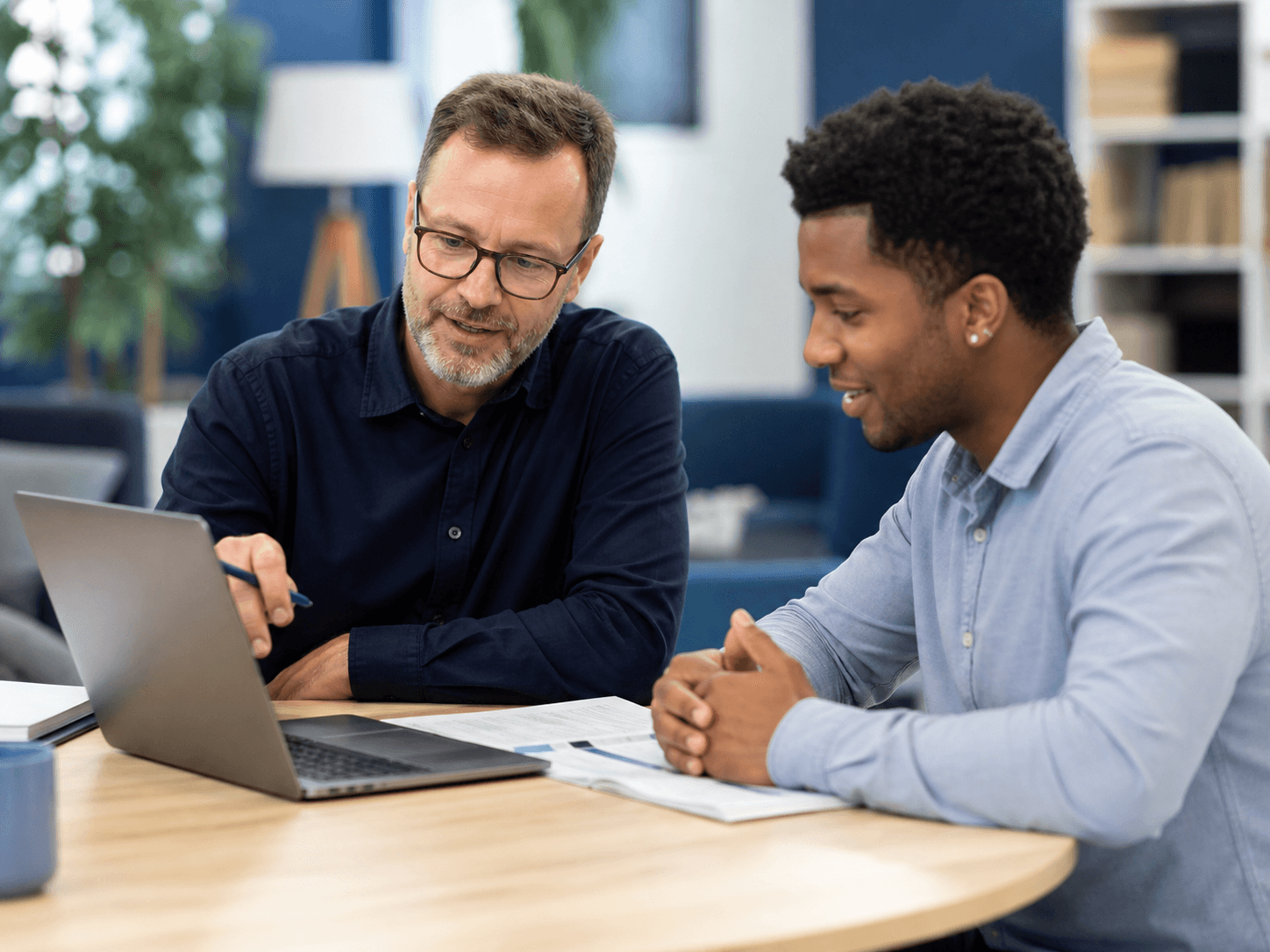 A recruiter and candidate reviewing matched career opportunities together